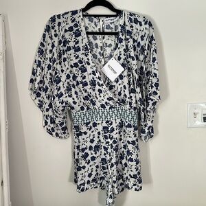 Kittenish floral romper. Size medium. NWT
